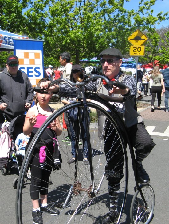 Murray mounting the Penny farthing